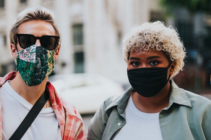 Two people with masks on