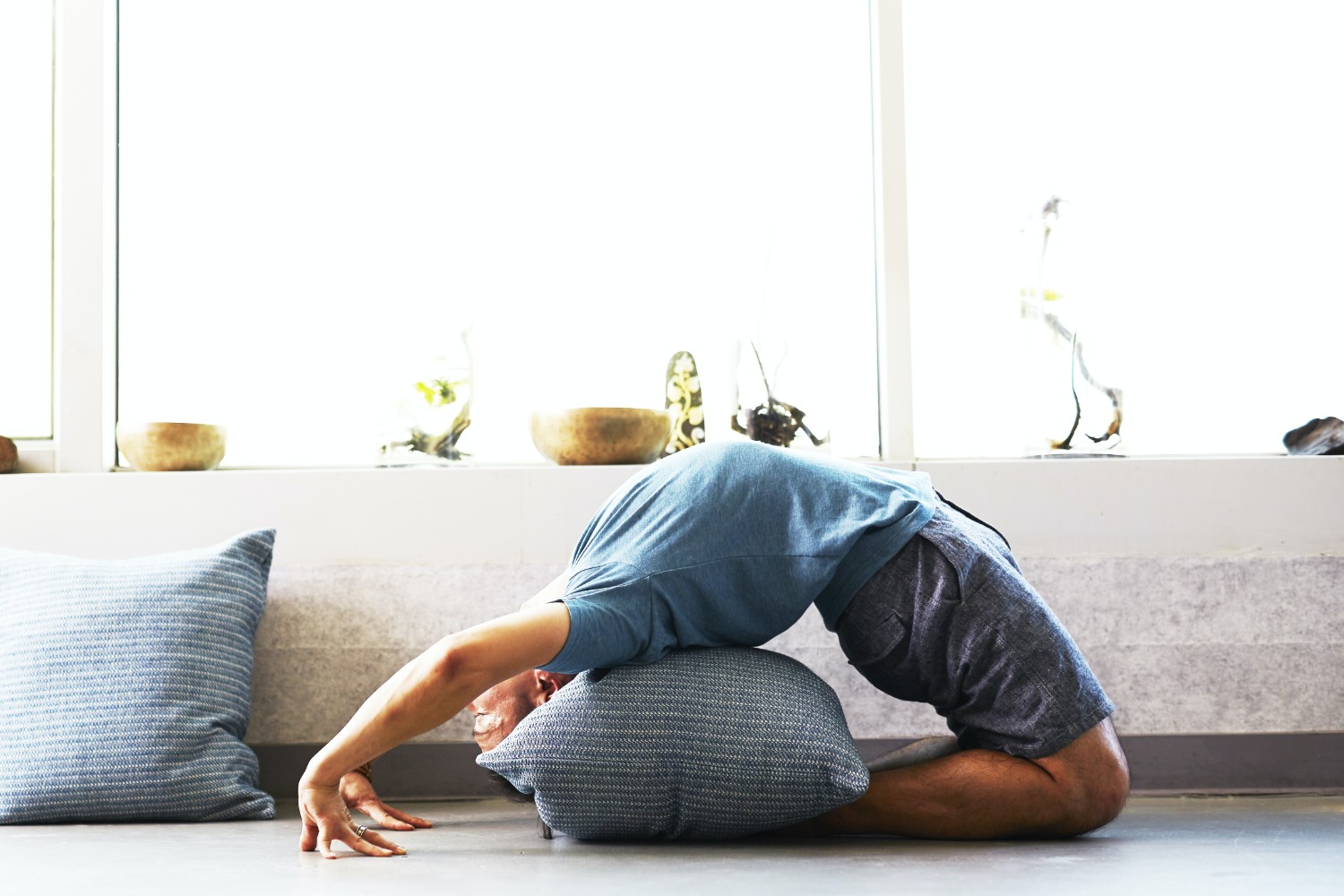 man doing backbend yoga
